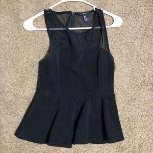 Black peplum top in M